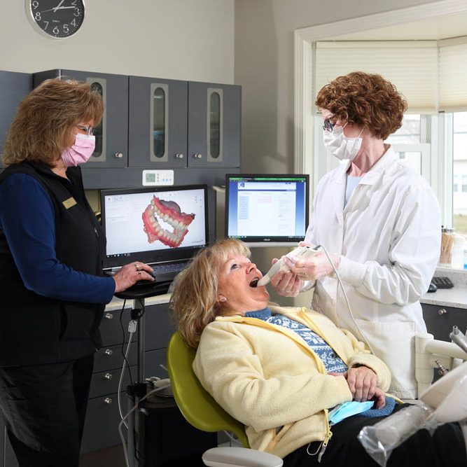Patient having dental exam performed